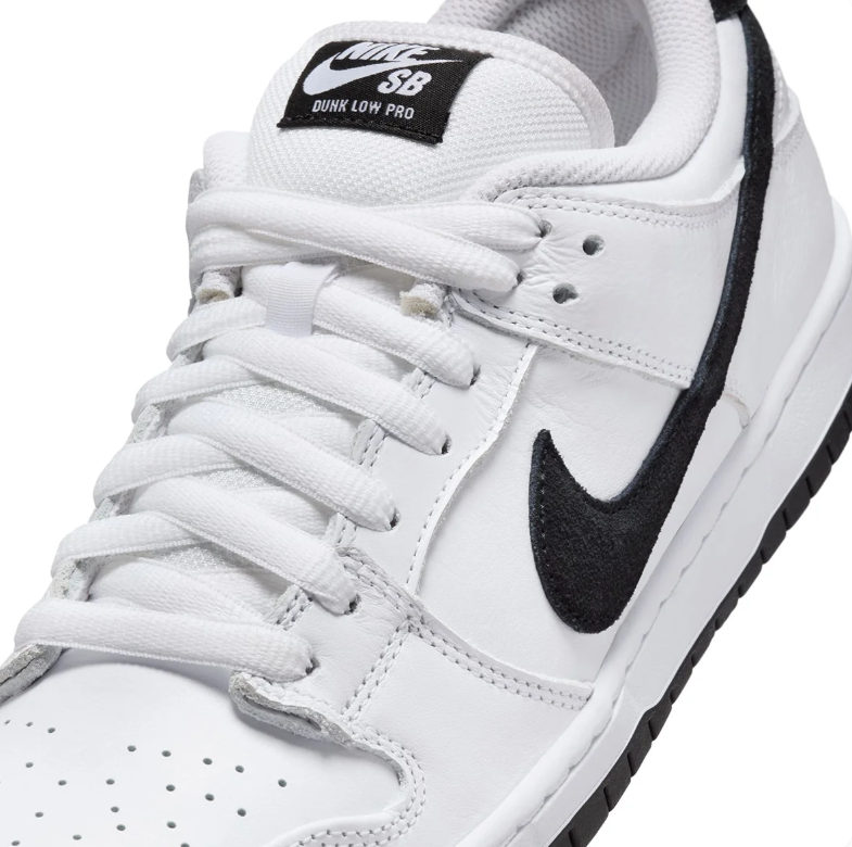 Nike SB Dunk Low Pro Sneakers in White and Black