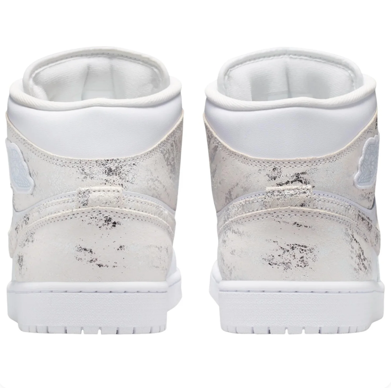 Air Jordan 1 Mid Sneakers in White with Metallic Silver Accents