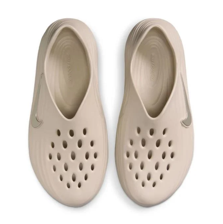 Nike Slip-On Clogs in Sand Beige with Sculpted Wave Detailing