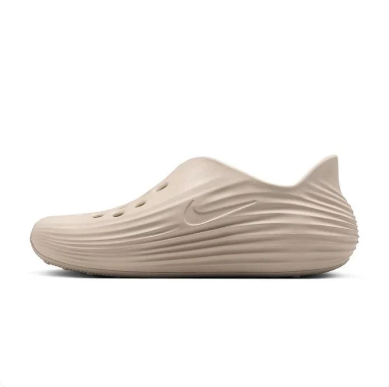 Nike Slip-On Clogs in Sand Beige with Sculpted Wave Detailing