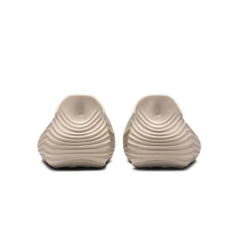Nike Slip-On Clogs in Sand Beige with Sculpted Wave Detailing