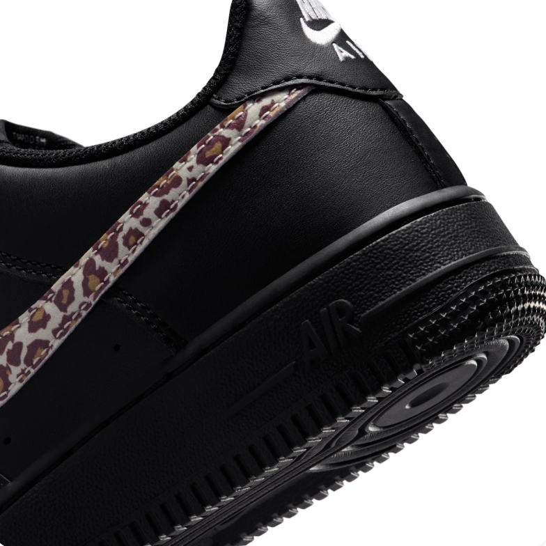 Nike Air Force 1 Low Sneakers in Black with Leopard-Print Swooshes